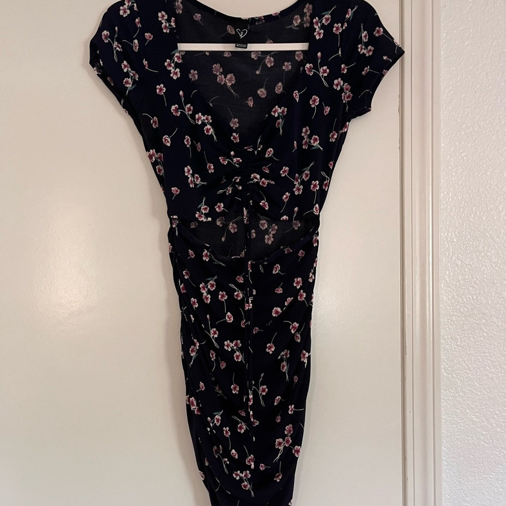 Navy blue dress floral dress with an open front.